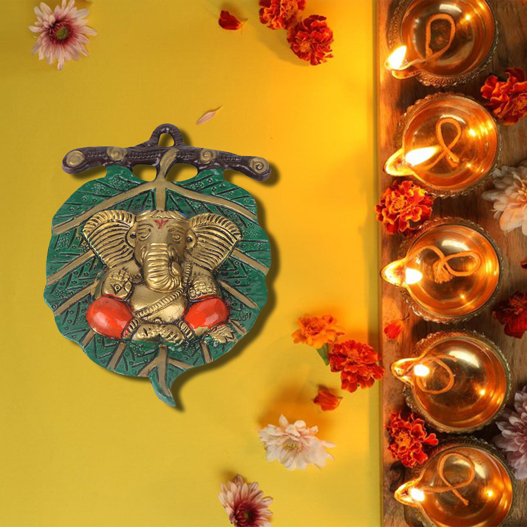 Devnidhii Ganesh Ji on Green Leaf Wall Hanging in Gold Polish