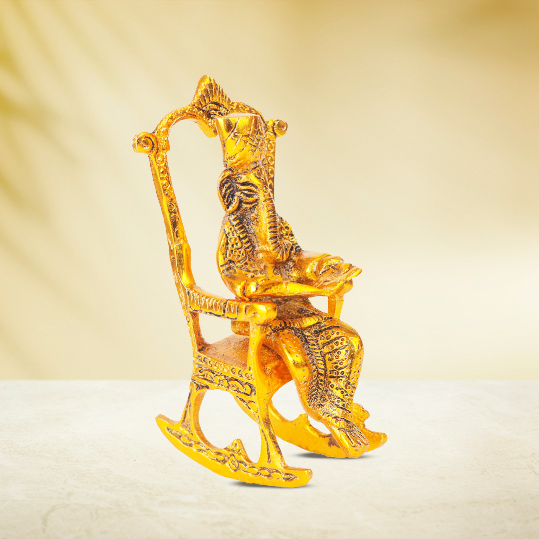 Devnidhii Ganesh Ji Idol Reading Scripture on Chair in Gold Polish
