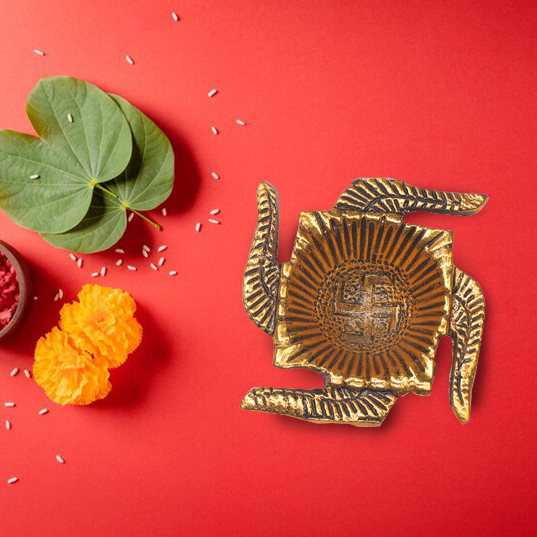 Devnidhii Diya Swastik Shaped in Gold Polish