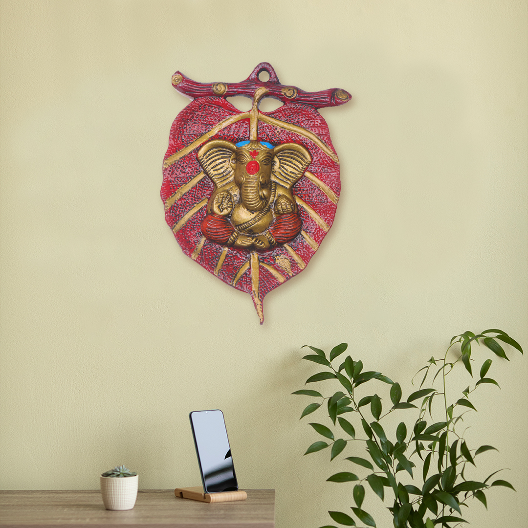 Devnidhii Ganesh Ji on Red Leaf Wall Hanging in Gold Polish
