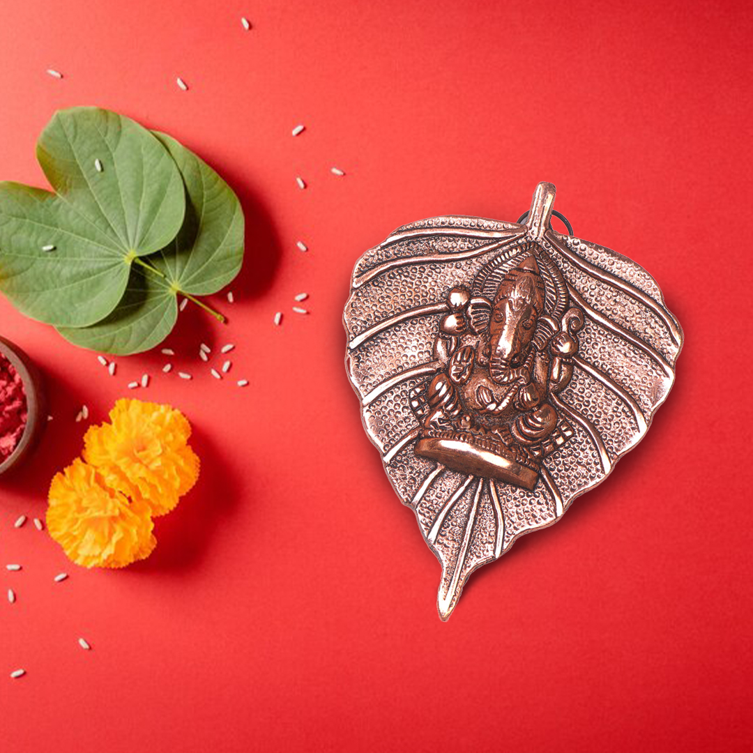 Devnidhii Ganesh Ji on Copper Colour Leaf Wall Hanging
