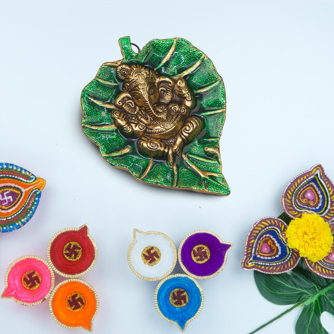 Devnidhii Ganesh Ji on Meenakari Leaf Wall Hanging