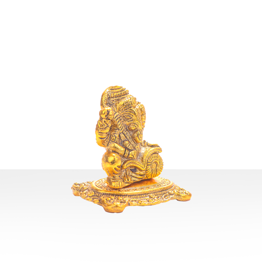 Devnidhii Ganesh in Writing Mudra in Gold Polish
